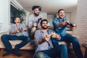 men playing video-game - Design for Recovery