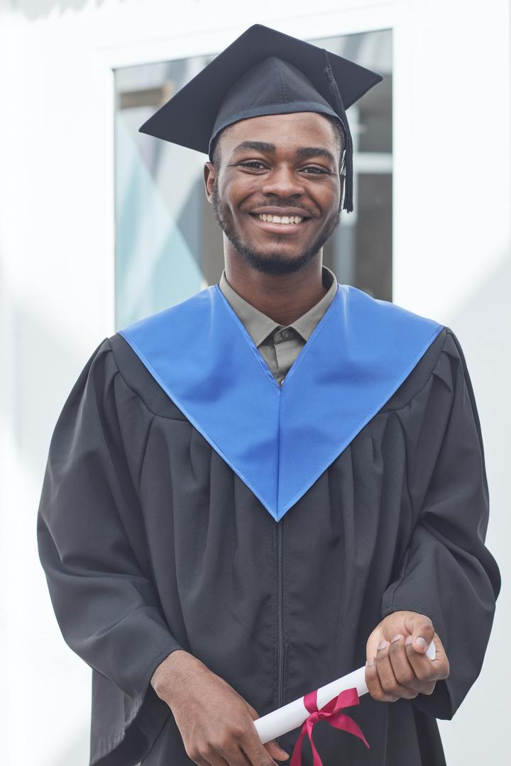 Young man in graduation gown